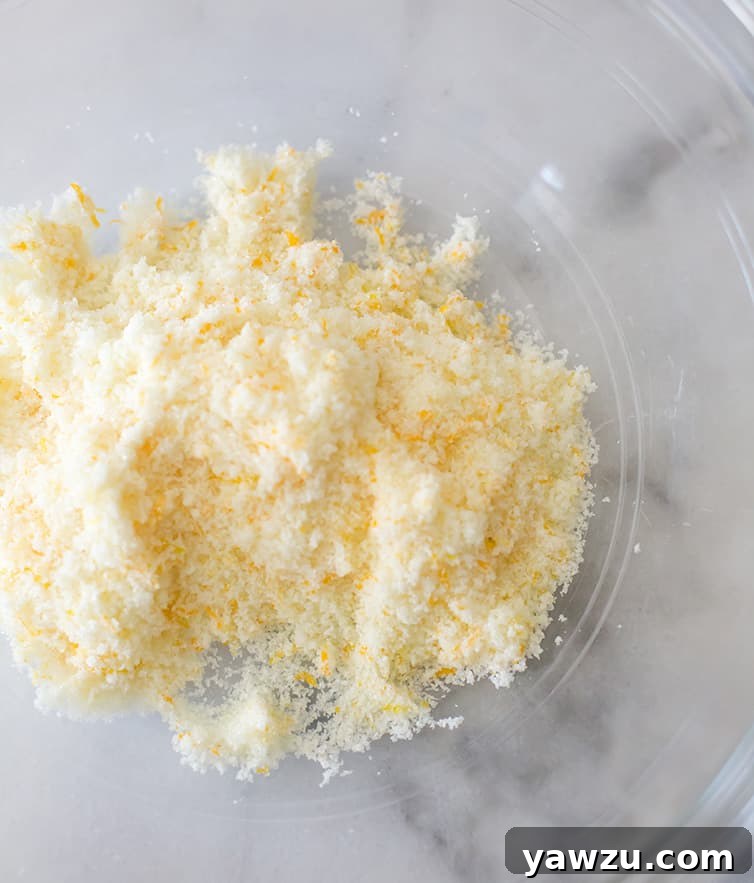 A bowl of sugar infused with orange zest.