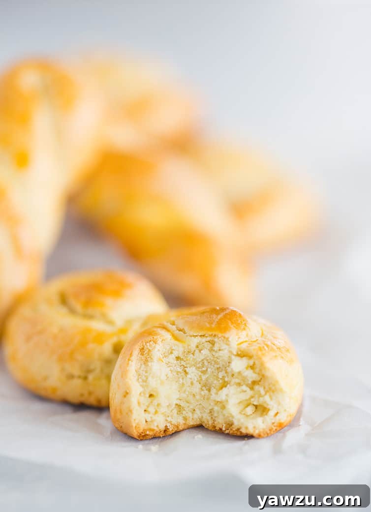 Koulourakia cookie with a bite taken out.