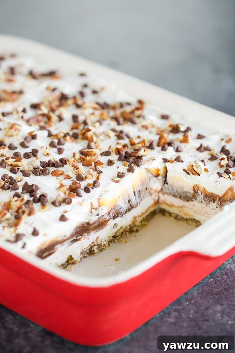 A full baking dish of chocolate lush dessert, showcasing its ready-to-serve presentation.