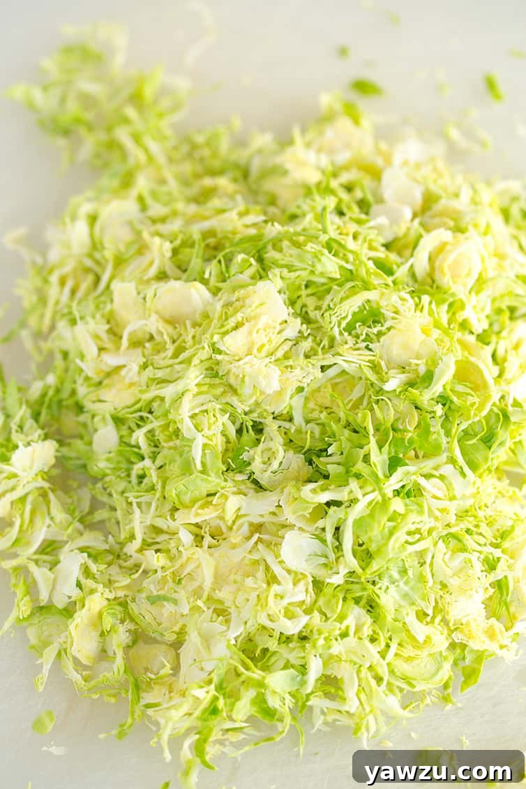 A pile of shaved Brussels sprouts.