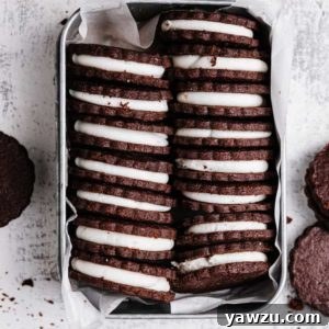 Homemade Oreo cookies on a cooling rack.