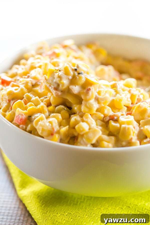 A vibrant bowl of Creamy Mexican Corn Salad, showcasing its colorful ingredients and rich texture.