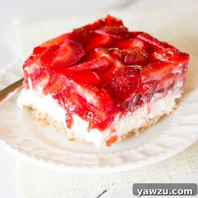 Strawberry Pretzel Salad - The absolutely wonderful nostalgic dessert that showed up at every summer family picnic growing up! | browneyedbaker.com
