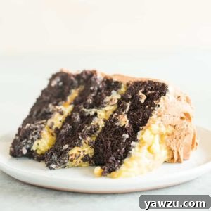 A decadent German Chocolate Cake slice showing moist layers and rich filling.