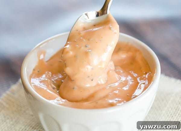 Close-up of a rich, creamy classic burger sauce, perfect for enhancing burgers, reminiscent of "special sauce" from popular fast-food chains.