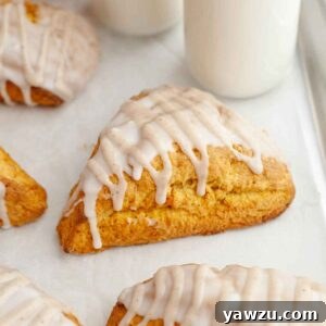 Close-up of a glazed pumpkin scone