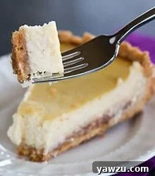 Hidden Berry Cream Cheese Torte - A luscious cream cheese filling sits atop a shortbread crust and a layer of strawberry jam. Discover this unique recipe at browneyedbaker.com