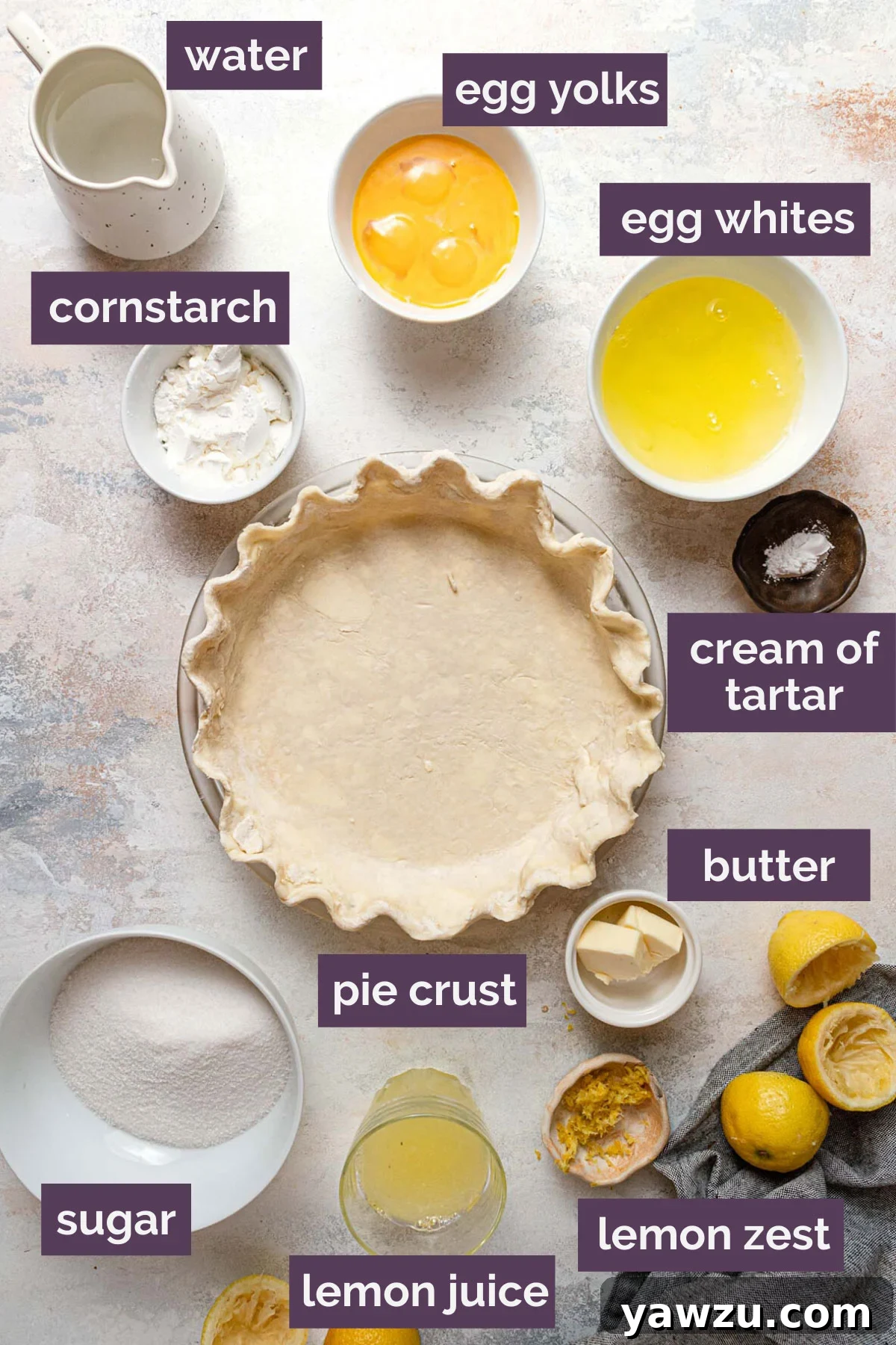 Various ingredients for lemon meringue pie meticulously prepped and labeled on a kitchen counter, ready for baking.