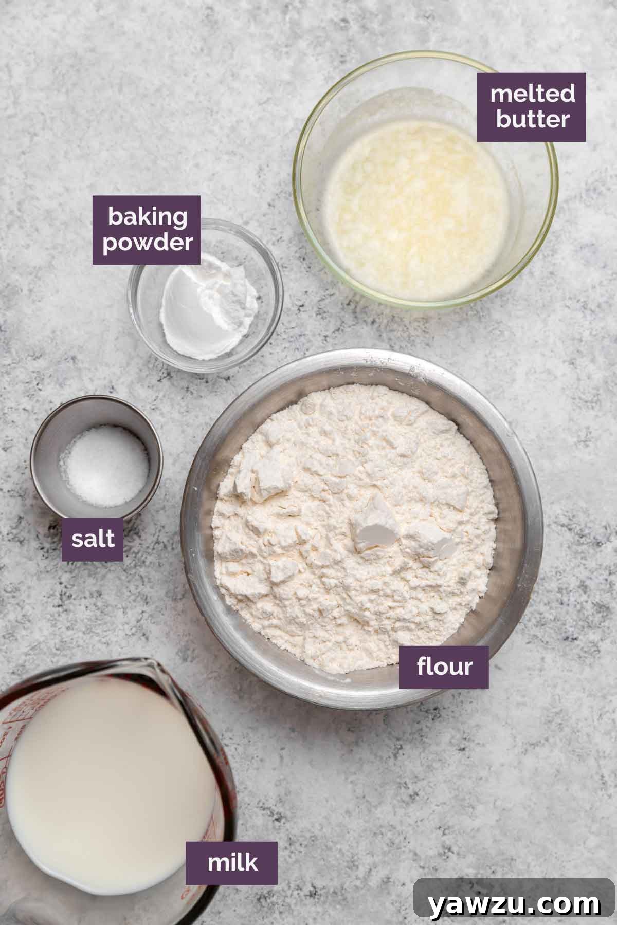 Ingredients for dumplings prepped on a countertop and labeled.
