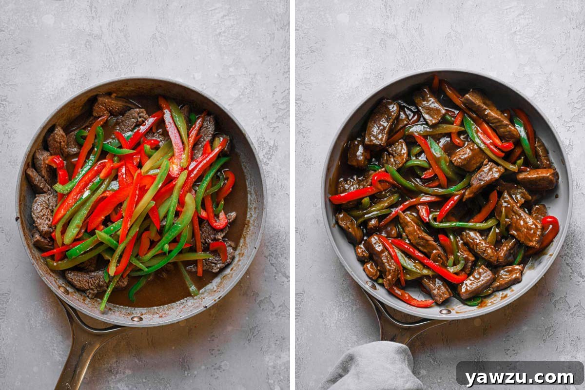 Cooked beef and bell peppers combined in a skillet, coated in a luscious, thickening stir fry sauce.