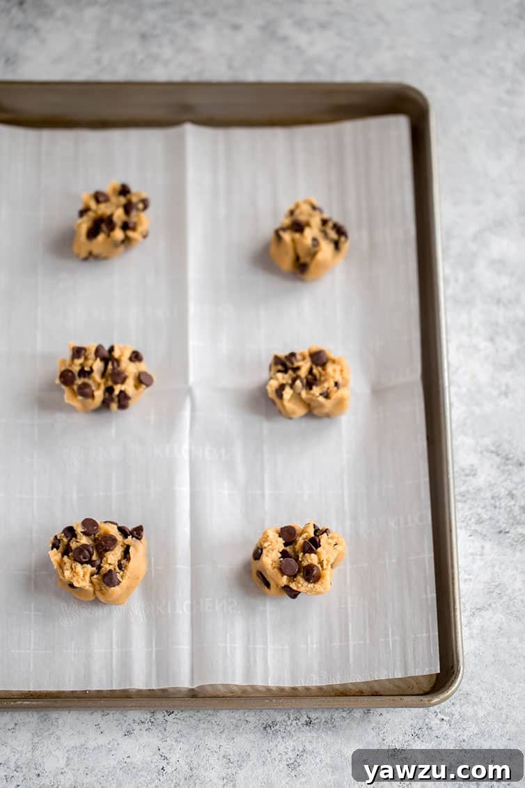 Another close-up of a stack of freshly baked chocolate chip cookies.