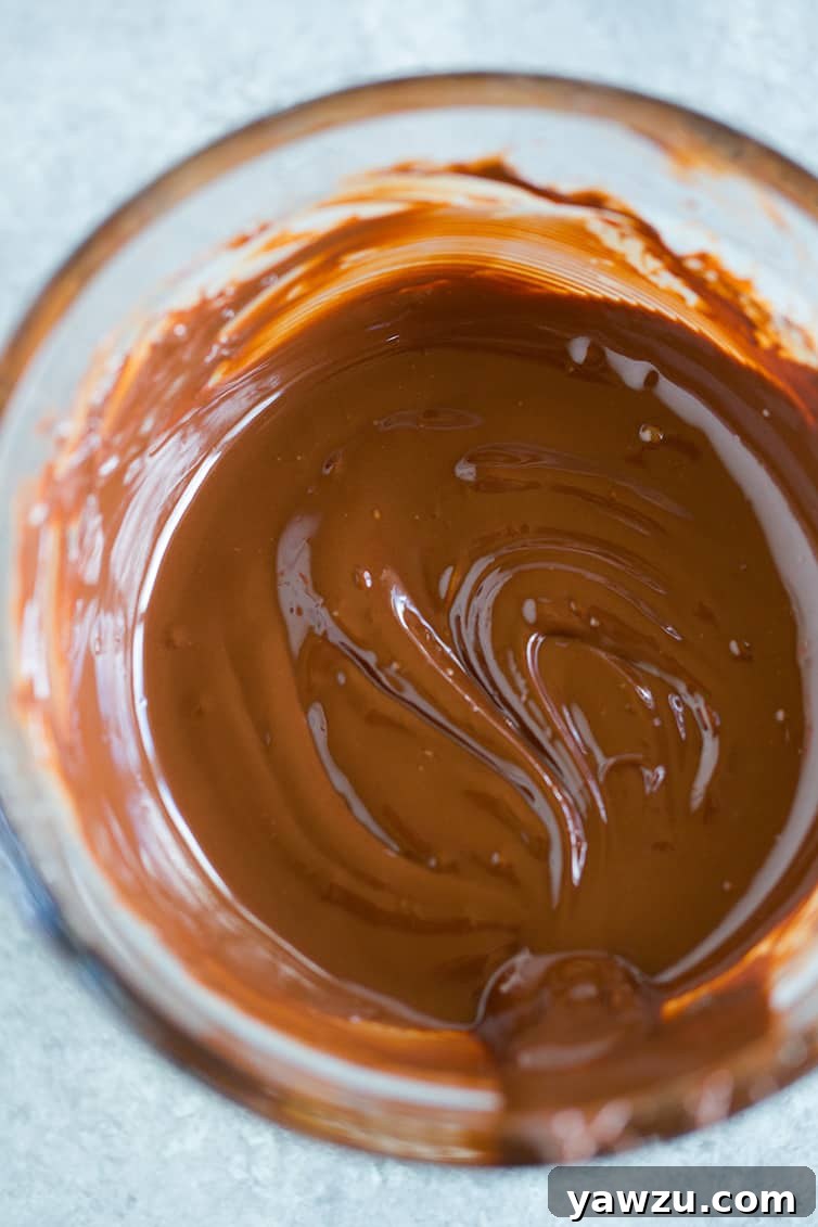 A bowl of melted chocolate.