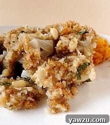 A close-up of the finished classic bread stuffing, golden-brown and ready to serve.