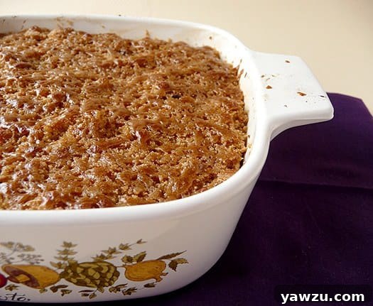 Mashed sweet potato brûlée in a casserole dish.