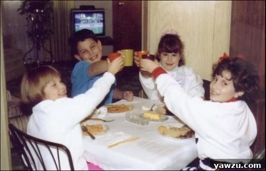 Vintage photo of kids cheers-ing with glasses at a Thanksgiving table.