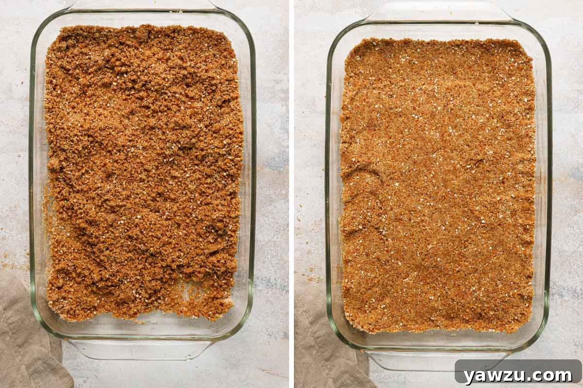 Overhead photo of pretzel crust pressed into glass nine by thirteen baking dish.